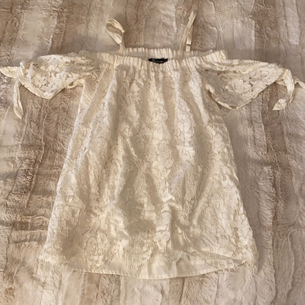 white off the shoulder top with lace.